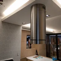 Instalacao de coifa cilindrica Brastemp em cozinha planejada por Miguel Refrigeracao no bairro Tijuca em Campo G
