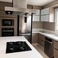 Instalacao de coifa e eletrodomesticos em cozinha planejada por Miguel Refrigeracao no bairro Tijuca em Campo Gr