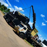 Caminhão Munk transportando tanque de água na Ferro e Solda Marcon Munk em Campo Grande/MS!
