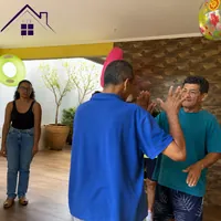 Idosos interagindo e se divertindo em atividade recreativa no CEI - Centro Especializado para Idosos no Monte Ca